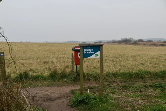 A sign beside the track into grazing marsh at Carlton Marshes