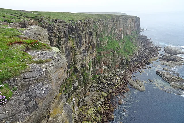 The steep sea cliffs west of Dunnet Head lighthouse